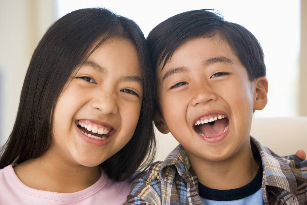 A picture of children smiling after dental examination in Avondale Dental Centre 