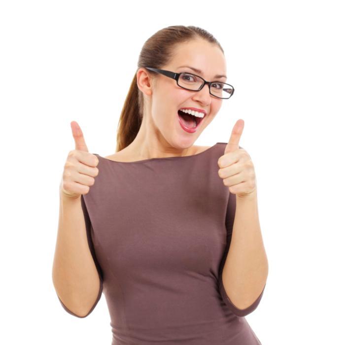 woman giving thumbs up | orthodontics avondale auckland