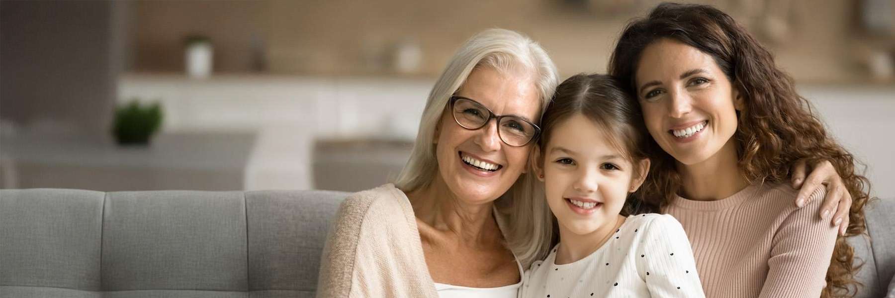 A family smiling after a dental session in in Auckland