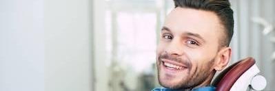 Man after dental cleaning in Avondale