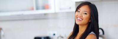 A picture of a smiling lady after dental examination in Avondale, Auckland