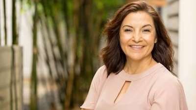woman in pink top smiling | dentist 1026