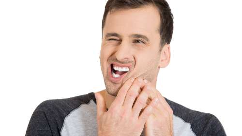 A Man holding his jaw in Avondale