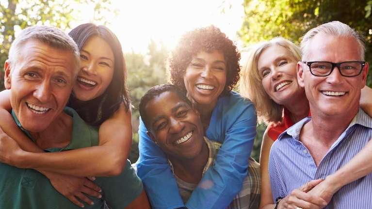 group of friends smiling | avondale dental centre