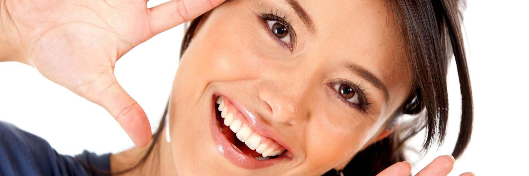 A lady smiling after getting dental crowns in Avondale Dental Centre 