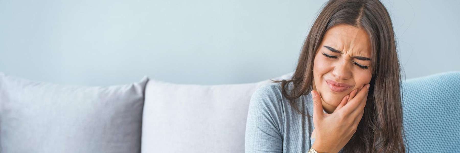 an woman with a toothache in Avondale