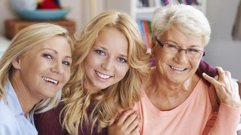 A family smiling after Dental Cleanings in Avondale